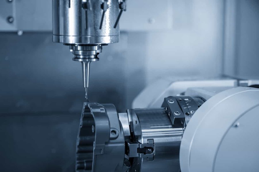End mill cutting a part in a CNC machining centre