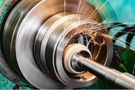 Internal grinding of a bore, small wheel on an extended spindle